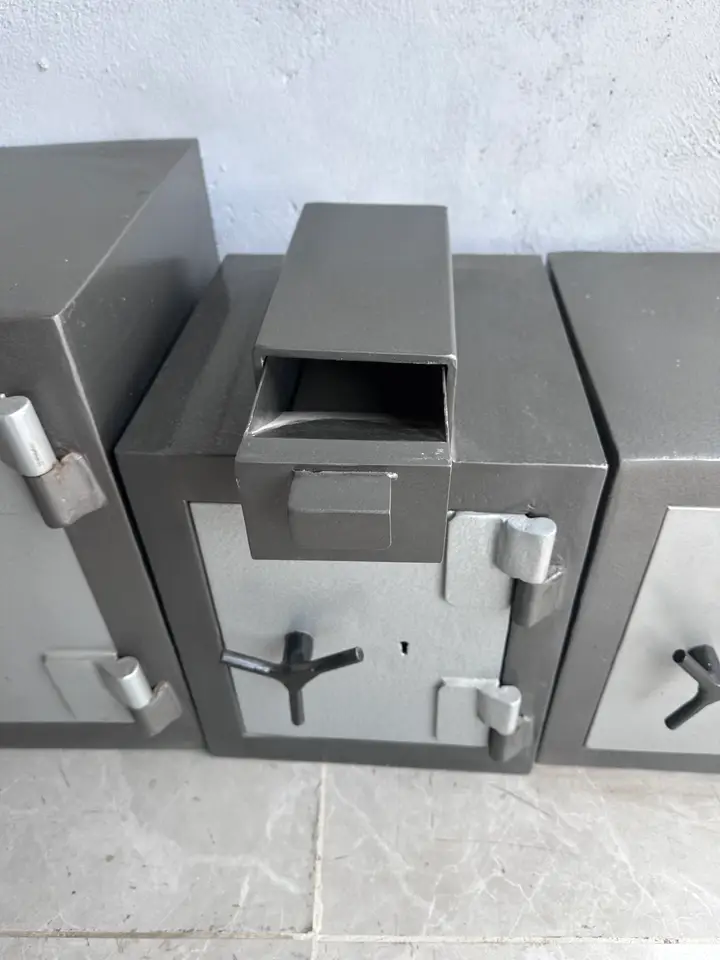 Shellmate drop safe with its top deposit hopper pulled open
