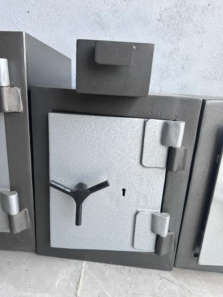 Shellmate drop safe with a deposit hopper on top and a key lock