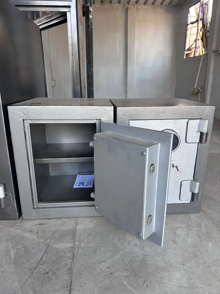 Shellmate safe with its door open, showing the steel interior and shelf