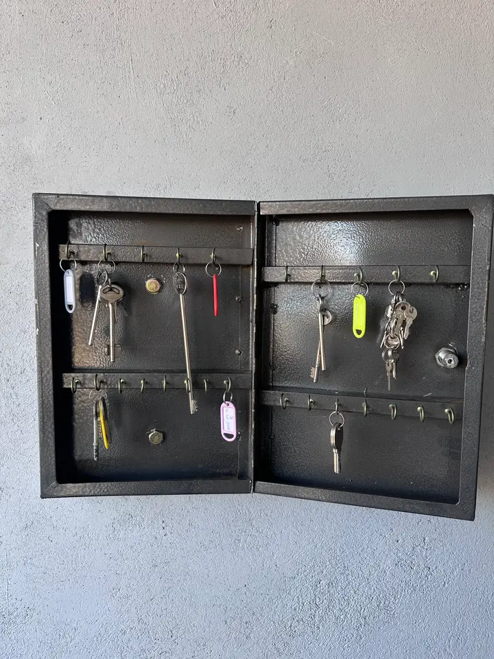 Open Shellmate steel key cabinet with rows of key hooks